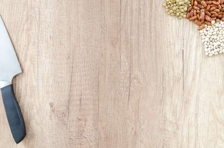 Beans mix with knife on wooden tableの写真素材