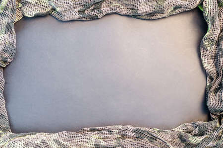 Camouflage on black backgroundの写真素材