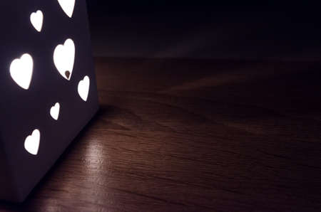 Lantern glow on wood backgroundの写真素材