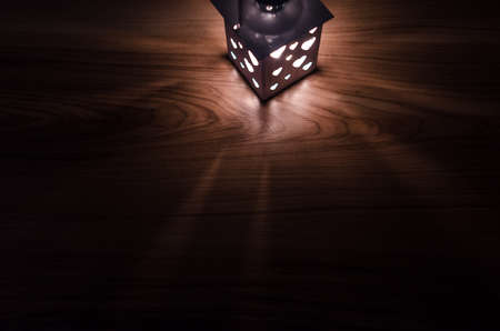 Lantern glow on wood backgroundの写真素材