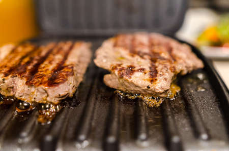 Beef steak on grillの写真素材