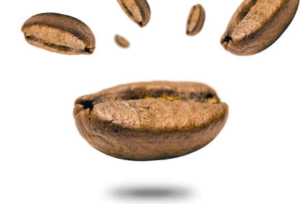 Falling coffee bean isolated