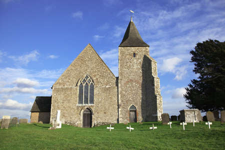 12th century church, St Clement, on the Romney Marsh, a very rural setting.の写真素材