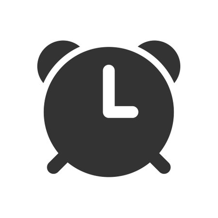 Alarm clock glyph vector iconのイラスト素材