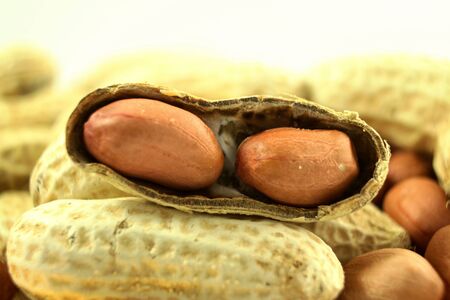 peanuts whole and peeled closeupの写真素材