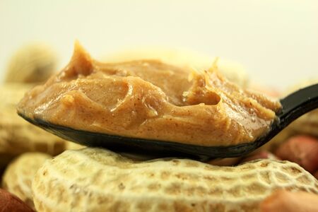 peanut butter  in spoon closeup
