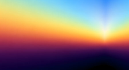 A digital illustration of a pixelated abstract background featuring a warm to cool color gradient and a bright light source resembling a sunrise or sunset.の素材