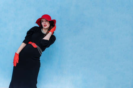 beautiful young woman in different poses on different backgroundsの写真素材