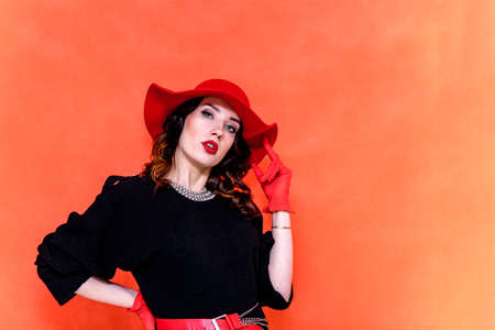 beautiful young woman in different poses on different backgroundsの写真素材