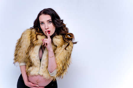 beautiful young woman in different poses on different backgroundsの写真素材