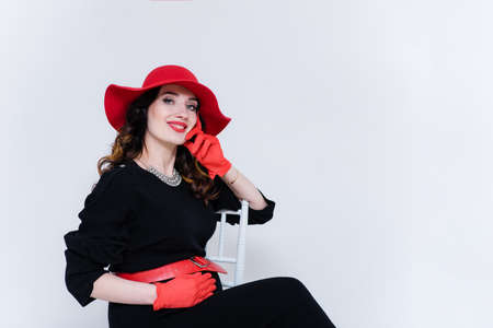 beautiful young woman in different poses on different backgroundsの写真素材