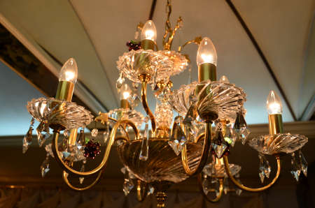 A closeup of crystal and decoreation from the chandelier (Dim)の写真素材