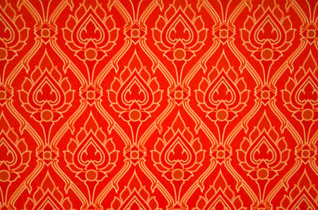 Red Thai-art wallpaper with a nice lotus pattern