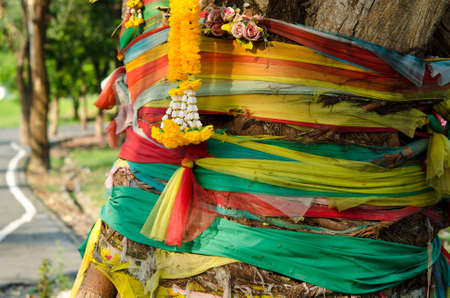 In Thailand, people use to show respect to the large-old trees with colorful clothes. Because they believe there are tree angelsのeditorial素材