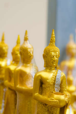 Little Buddhas in a row 2の写真素材