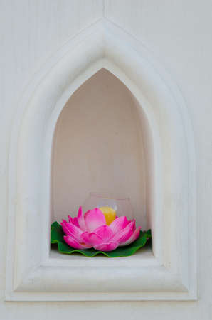 Craft Lotus, made of beewax in the temple wall of Thailandの写真素材