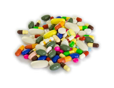 Pile of pills in white isolation background
