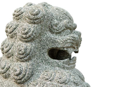 An ancient stone lion statue with isolation background の写真素材