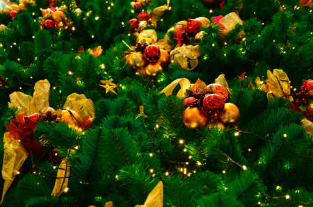 Colorful Christmas pattern with ornaments and lightsの写真素材