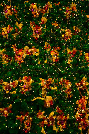 Colorful Christmas pattern with ornaments and lightsの写真素材