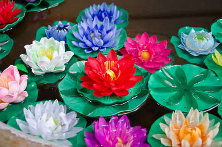Bowl of color artificial Lotus  This is a modern Thai art の写真素材