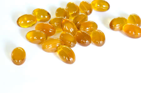 Rice bran oil pills on white background  They are famous supplementary food の写真素材