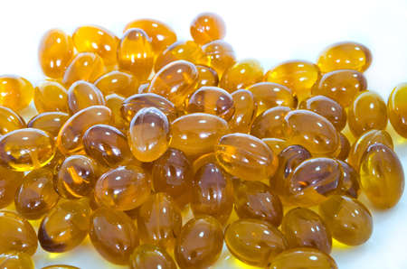 Rice bran oil pills on white background  They are famous supplementary food の写真素材