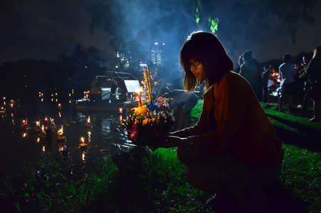 12 November 2012  Loy Kratong festival to worship river goddess in Thailand on a full moon day  People will put a lantern made of leaves in the water with respect and wish for success のeditorial素材