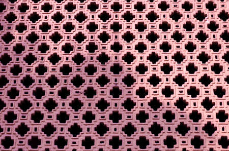 Old pink Brick wall with strange pattern in Chinese artの写真素材