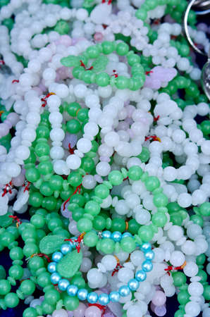 Pile of Jade Bracelet in Thai marketの写真素材