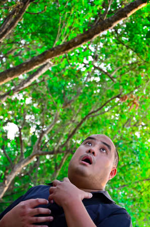 A big guy is shocking in the wood. It must be really scary