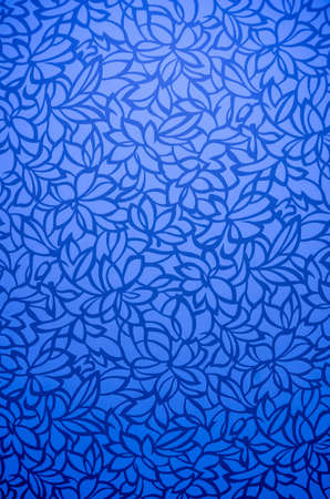 Blue flora background with shade and gradientの写真素材