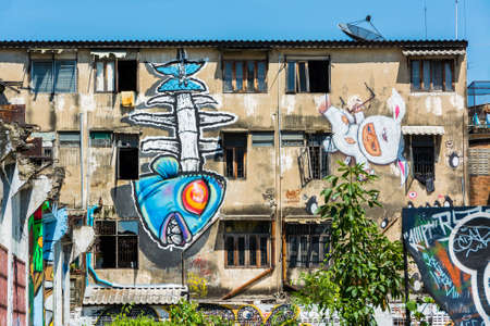 Giant graffiti on the abandon building in Thailand, shoot in public streetのeditorial素材