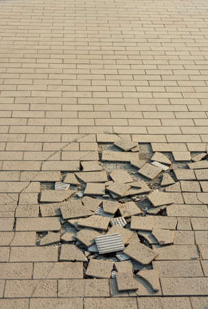 Crack ground made with tile material.の写真素材