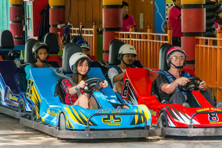 BANGKOK, THAILAND - 10 MAY 2013: Thai people perpare for a go-kart race at Dream World on May 10, 2013. Dream world is a famous amusement park in Thailand.のeditorial素材