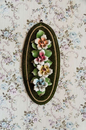 Ceramic flowers on the floral wall with retro styleの写真素材