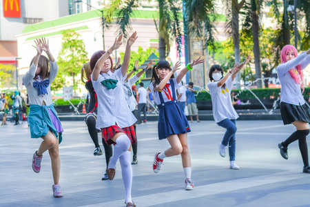 BANGKOK, THAILAND - MARCH 31: Group of Thai cosplayers dancing like cover girls for public show in the 3rd Thai-Japan anime festival on March 31, 2013.のeditorial素材