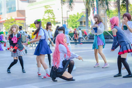 BANGKOK, THAILAND - MARCH 31: Group of Thai cosplayers dancing like cover girls for public show in the 3rd Thai-Japan anime festival on March 31, 2013.のeditorial素材