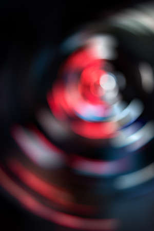 Abstract colorful lights spinning in circular backgroundの写真素材
