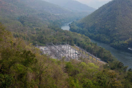 Electricity power plant in the misty valley of Thailandの写真素材