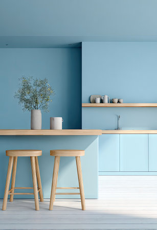 This image showcases a contemporary kitchen with a cool blue color scheme and wooden accents. Two stools sit at a light-colored wooden countertop, with a vase and small containers adding decor. The composition features clean lines, flat surfaces, and soft lighting, suggesting an inviting and functional space ideal for commercial or home design projects.の素材