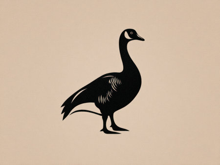 A striking silhouette of a goose dominates the frame, rendered in solid black against a neutral-toned backdrop. The image emphasizes the bird's form and posture. This graphic composition may be used for various purposes, including logos, illustrations, or design elements, enhancing visual communication.の素材