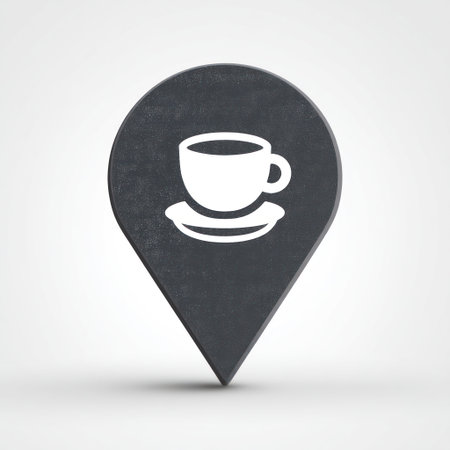 A dark gray location marker features a white coffee cup icon centered within its shape. The design uses a simple, modern style with soft shading, suggesting a three-dimensional effect. The image is set against a clean white backdrop, creating a sense of clarity, suitable for various commercial uses.の素材