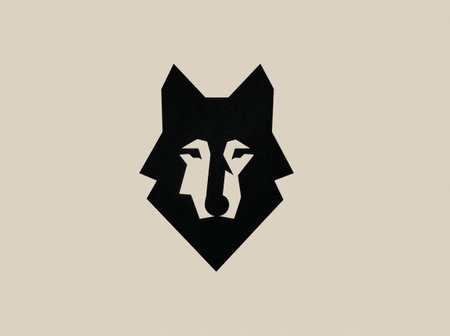 A minimalist design features a black geometric wolf head, centrally positioned against a neutral beige background. The graphic emphasizes sharp angles and flat shapes. It suggests a modern, simple aesthetic, ideal for various commercial applications, including branding and design projects, requiring clean, versatile visuals.の素材