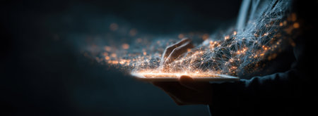 An image presents hands cradling glowing particles, symbolizing technology or data. The composition features a dark ambiance with a focus on light and contrast. This visual could be used in design or editorial projects to depict information, connectivity or innovation.の素材