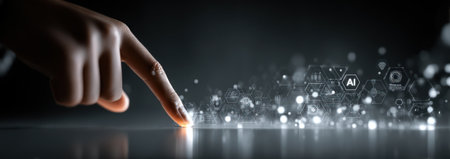 A close-up shot shows a finger interacting with a glowing digital interface. The image features a dark background with bright, abstract light particles. This conceptual illustration suggests technological interaction and could be used for various projects related to innovation, business, and technology. It can be utilized in websites, presentations, and marketing materials.の素材