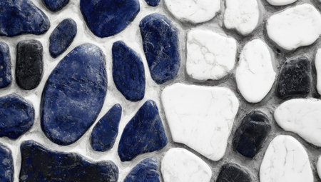 This image presents an abstract pattern featuring stones in varying shades of blue, black, and white. The composition highlights a textured surface, possibly suggesting a wall or pavement. The color palette and design offer a versatile backdrop suitable for various commercial uses, including website backgrounds and graphic design projects.の素材