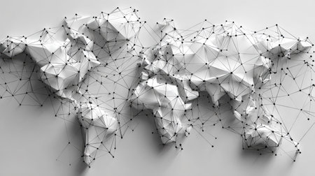 An overhead view displays a digitally rendered world map in shades of white. The map is formed from interconnected triangular shapes, with lines connecting various points. The composition is likely created for illustrating global networking, communications, or technological concepts, and could suit a variety of business or editorial applications.の素材