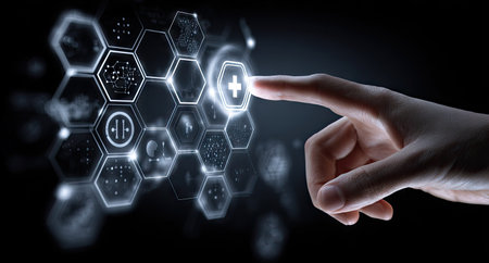 A close-up view presents a hand interacting with a digital interface, featuring glowing hexagonal elements. The illustration showcases medical symbols and a plus sign. The composition utilizes a dark backdrop, with bright, cool-toned illumination highlighting the technology. Suitable for applications related to healthcare and digital innovation.の素材