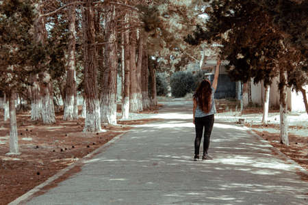 Girl in old abandoned ghost townの写真素材